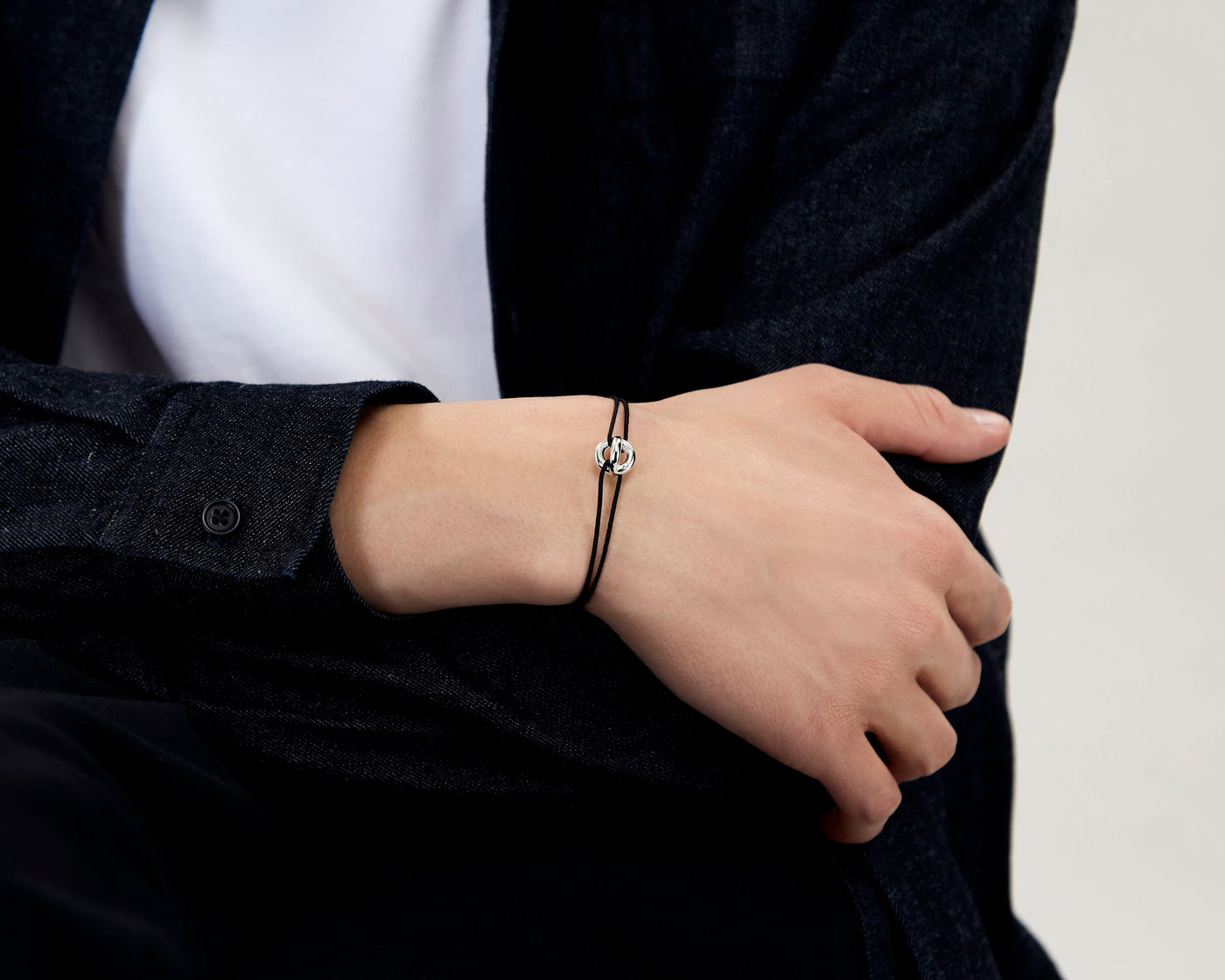 bracelet cordon entrelacs noir le 3g